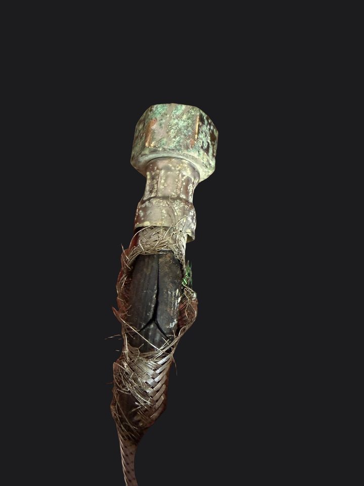 Burst braided supply line from high water pressure