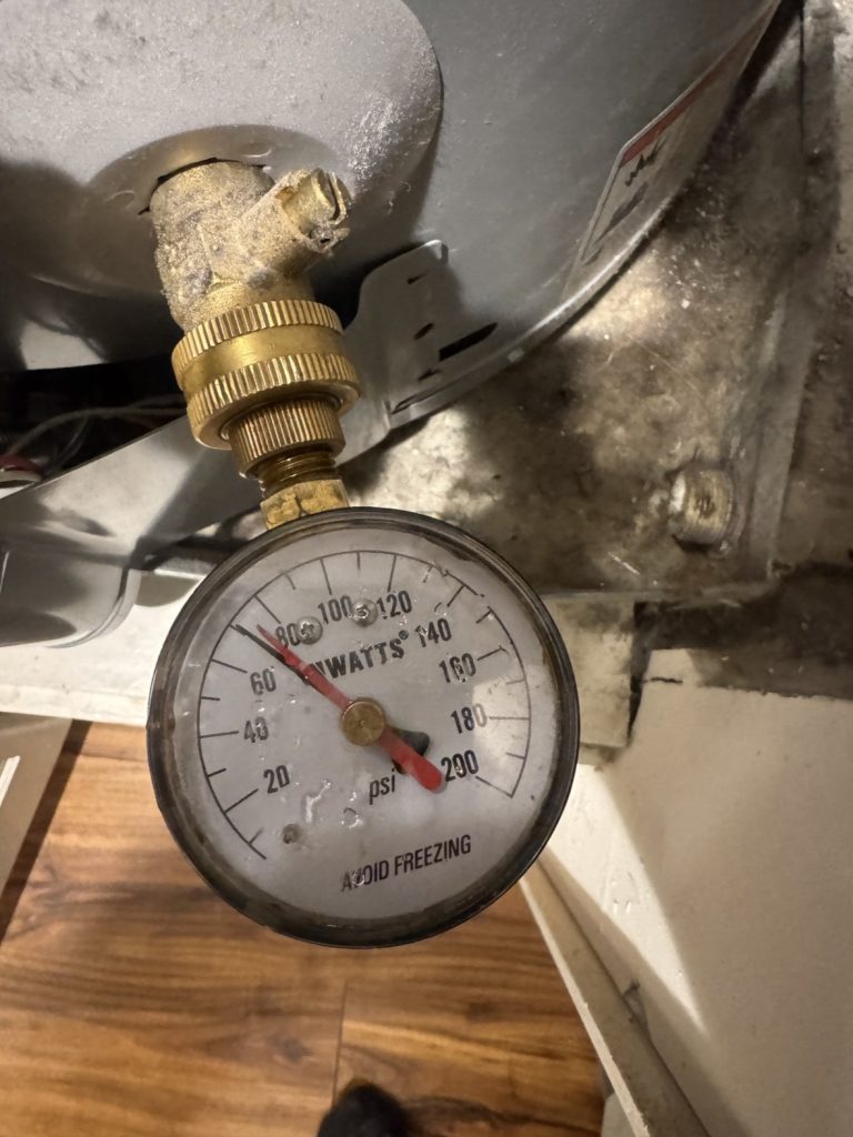 Water heater pressure test gauge, Marietta, GA